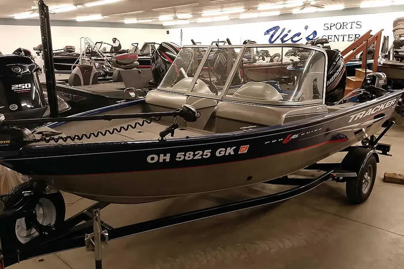 The Image of 2013 Tracker Pro Guide V-16 WT boat displayed at Vic's Sports Center. - 0