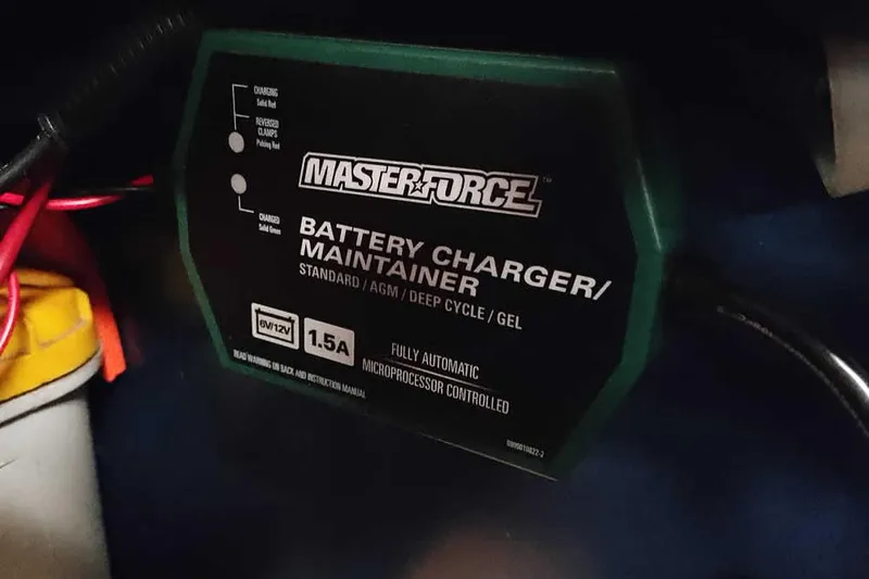 Slide: The Image of Masterforce battery charger for Tracker Pro Guide V-16 WT, 2013 model, automatic microprocessor controlled. - 17