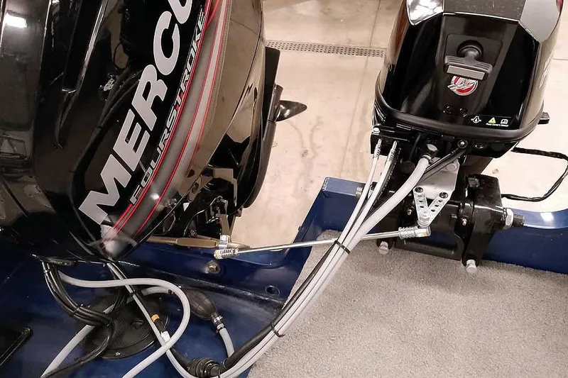 Slide: The Image of 2013 Tracker Pro Guide V-16 WT boat with Mercury FourStroke engine. - 36