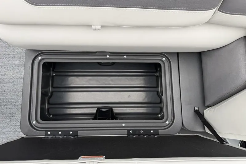 Slide: The Image of Storage compartment in 2026 Sun Tracker Fishin' Barge 20 DLX boat seat. - 11