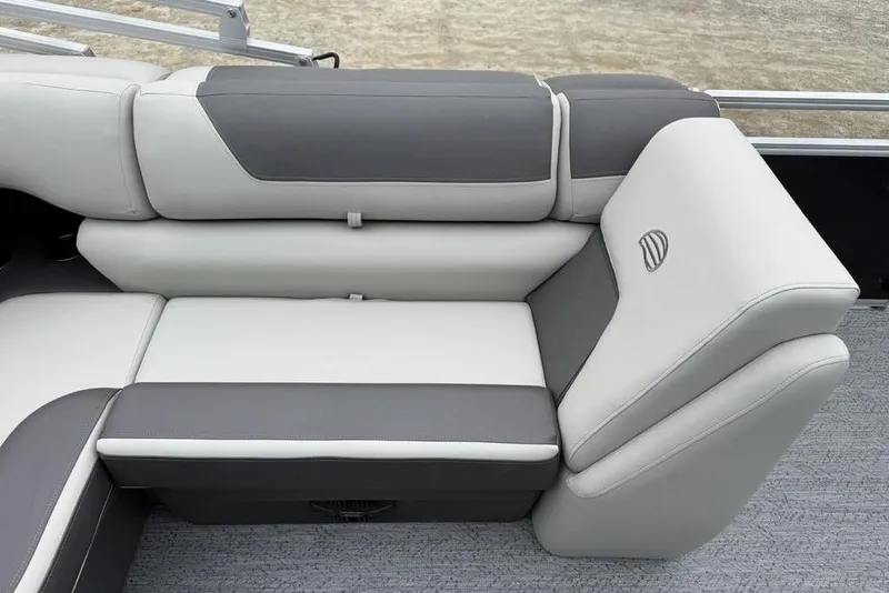 Slide: The Image of 2026 Sun Tracker Fishin' Barge 20 DLX, gray and white seating detail. - 15