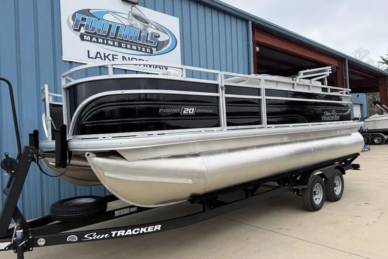 Slide: The Image of 2026 Sun Tracker Fishin' Barge 20 DLX pontoon boat on trailer at Foothills Marine Center. - 7