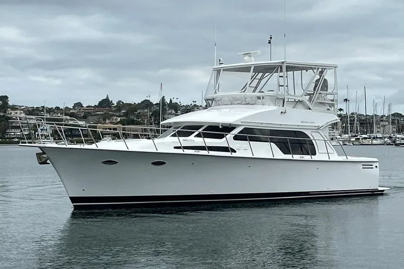 The Image of 2021 Mikelson Gen II 43 SF yacht on calm water, overcast sky background. - 0