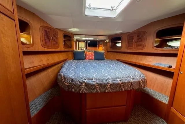 Slide: The Image of Luxurious cabin interior of 2021 Mikelson Gen II 43 SF yacht with cozy bedding. - 9