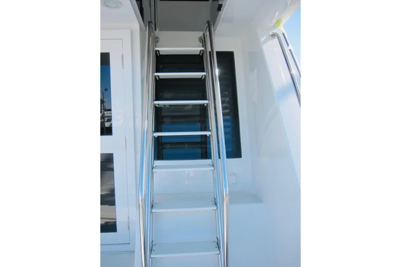 Slide: The Image of Stainless steel ladder on 1999 Delta Marine Raised Pilothouse Motoryacht. - 15