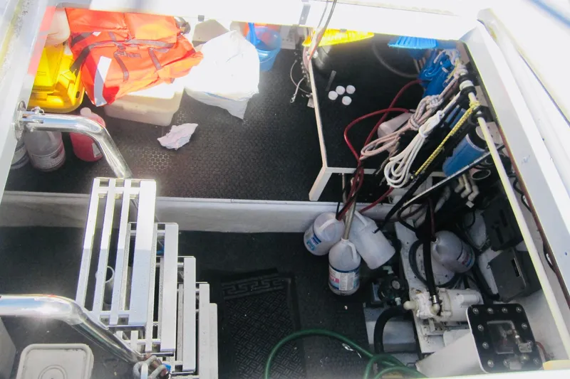 Slide: The Image of Storage compartment of a 1999 Delta Marine Raised Pilothouse Motoryacht with equipment and supplies. - 17