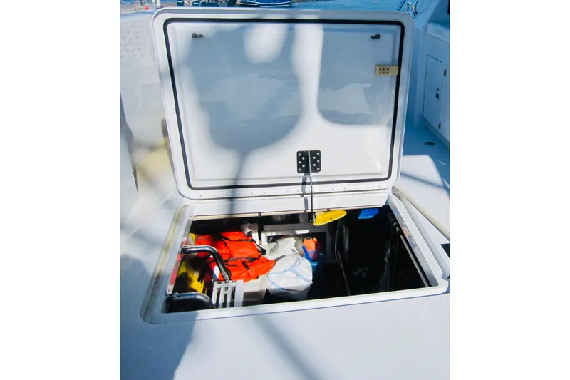 Slide: The Image of Open storage compartment on 1999 Delta Marine Raised Pilothouse Motoryacht deck. - 18
