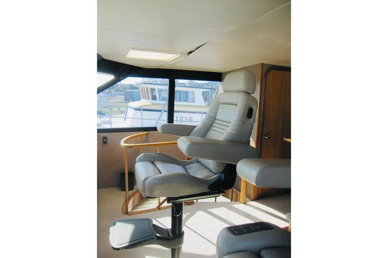 Slide: The Image of Luxurious pilothouse interior of 1999 Delta Marine Raised Pilothouse Motoryacht. - 24