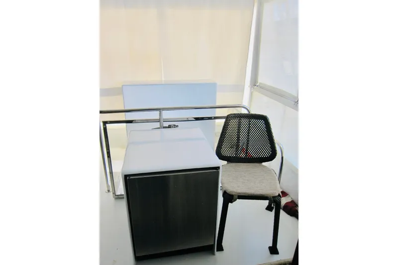 Slide: The Image of Chair and cabinet on Delta Marine Raised Pilothouse Motoryacht, 1999 model. - 35