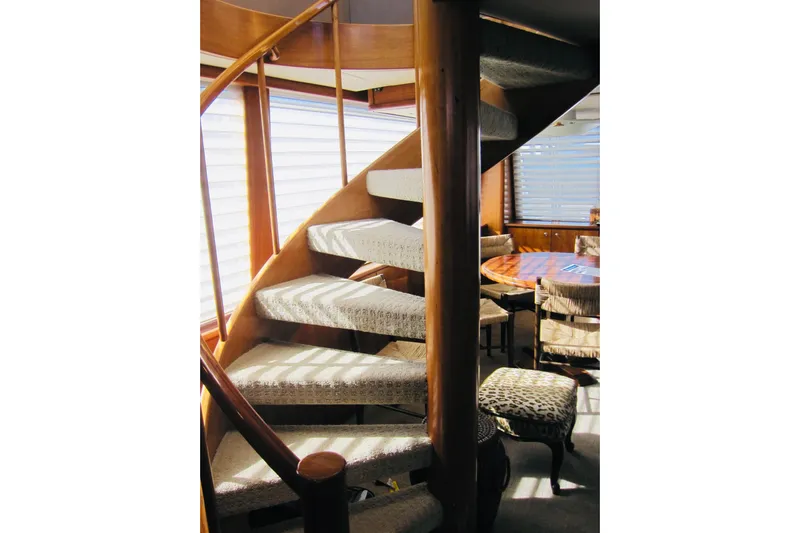 Slide: The Image of Luxurious spiral staircase inside 1999 Delta Marine Raised Pilothouse Motoryacht. - 36