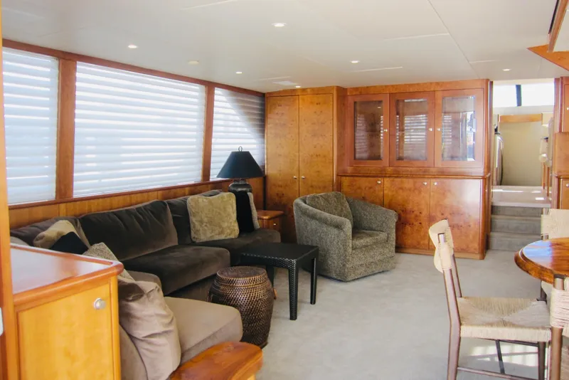 Slide: The Image of Luxurious interior of 1999 Delta Marine Raised Pilothouse Motoryacht with plush seating and wood accents. - 40