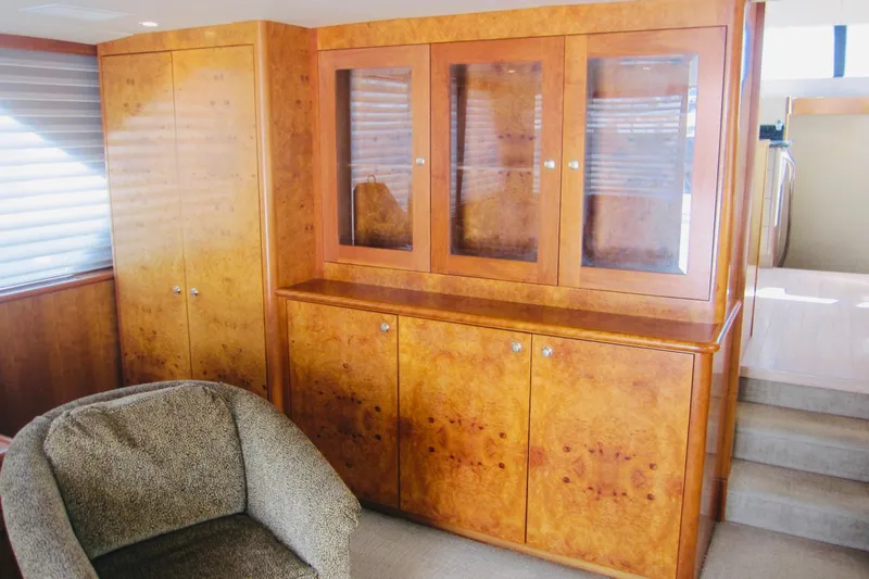 Slide: The Image of Luxurious interior of 1999 Delta Marine Raised Pilothouse Motoryacht with elegant wood cabinetry. - 41
