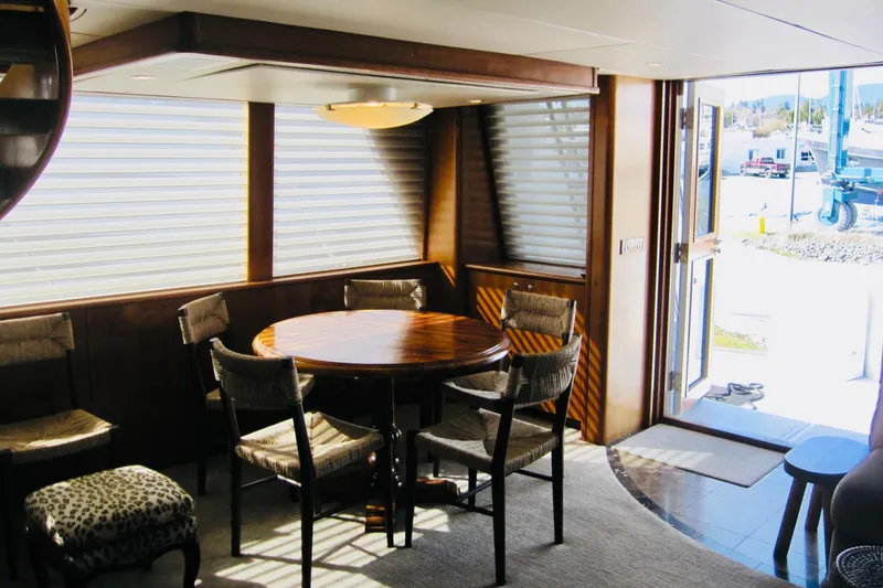 Slide: The Image of Luxurious dining area on 1999 Delta Marine Raised Pilothouse Motoryacht. - 43