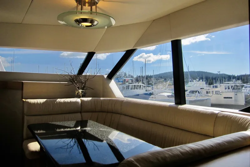 Slide: The Image of Luxurious interior of 1999 Delta Marine Raised Pilothouse Motoryacht with marina view. - 46