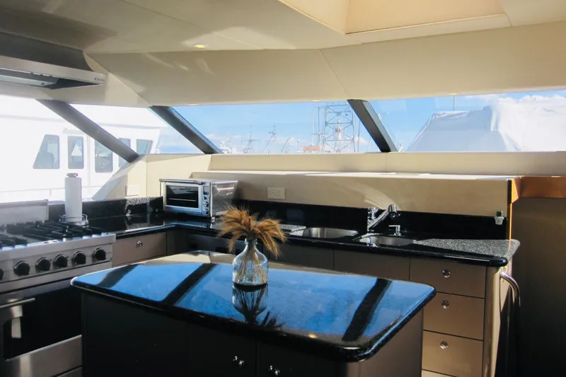 Slide: The Image of Luxurious kitchen interior of 1999 Delta Marine Raised Pilothouse Motoryacht with modern appliances. - 47