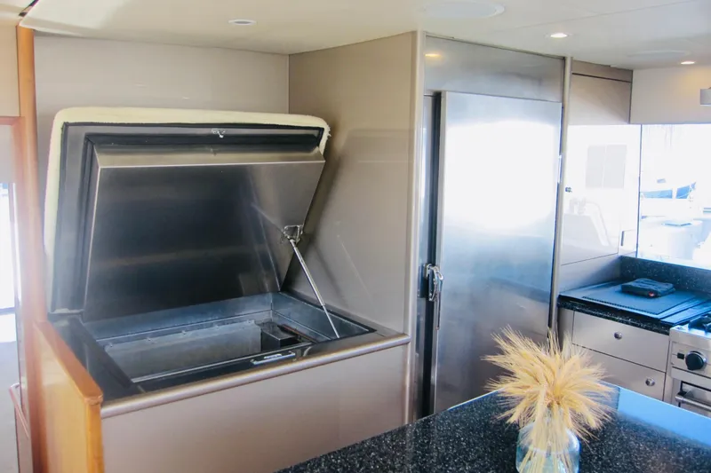 Slide: The Image of Luxurious yacht kitchen with stainless steel appliances, Delta Marine Raised Pilothouse Motoryacht, 1999. - 48