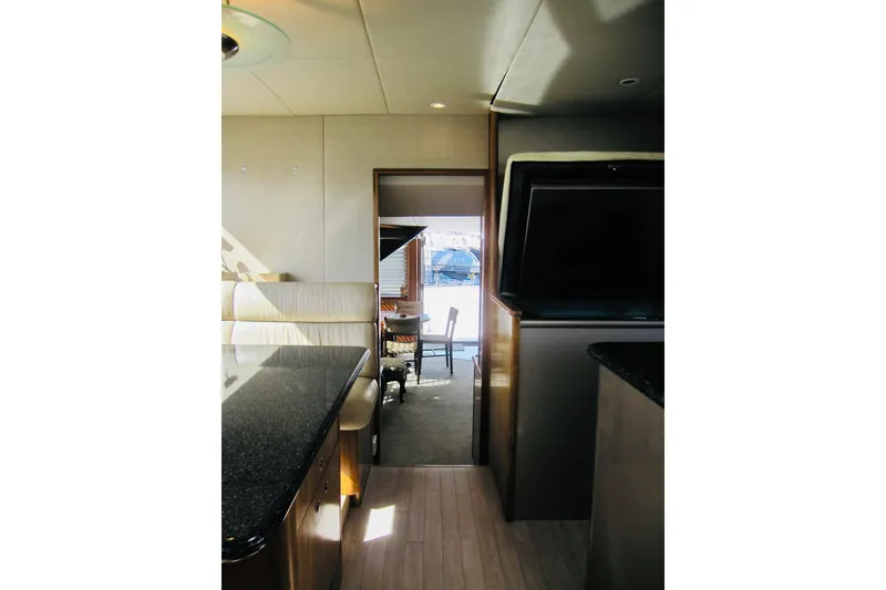 Slide: The Image of Interior view of 1999 Delta Marine Raised Pilothouse Motoryacht with modern furnishings. - 55
