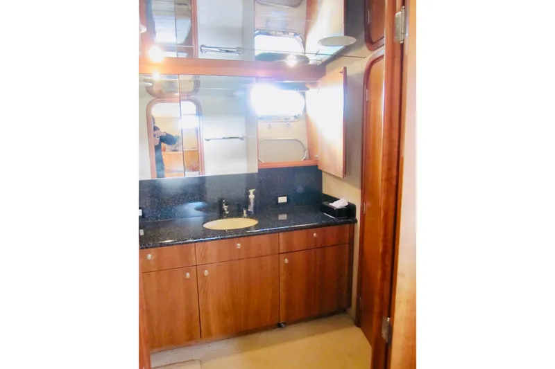 Slide: The Image of Luxurious bathroom interior on 1999 Delta Marine Raised Pilothouse Motoryacht. - 64