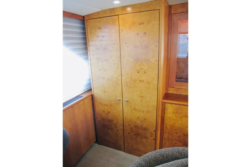 Slide: The Image of Wooden interior of 1999 Delta Marine Raised Pilothouse Motoryacht, featuring elegant cabinetry. - 66