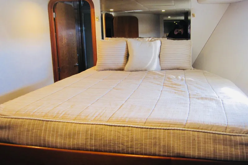 Slide: The Image of Luxurious bedroom interior of 1999 Delta Marine Raised Pilothouse Motoryacht. - 68