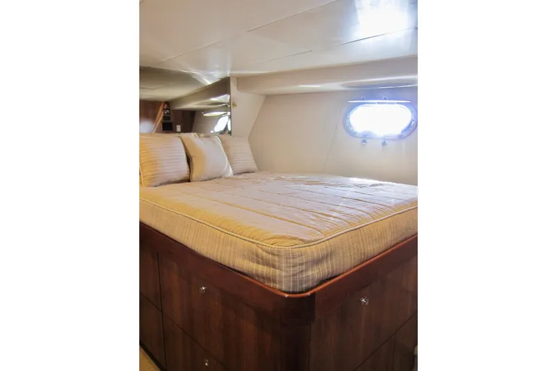 Slide: The Image of Luxurious cabin interior of 1999 Delta Marine Raised Pilothouse Motoryacht with cozy bed. - 69