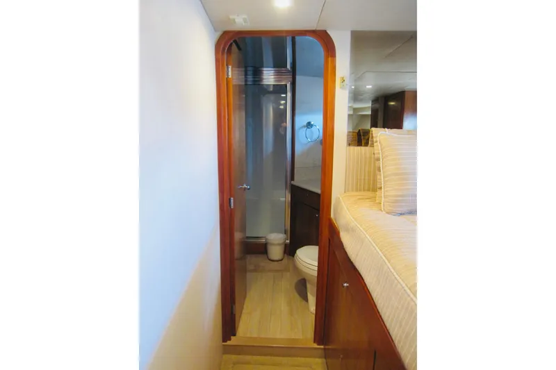 Slide: The Image of Interior of 1999 Delta Marine Raised Pilothouse Motoryacht with bathroom and cozy cabin. - 70