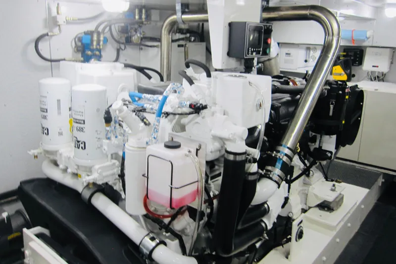 Slide: The Image of Engine room of 1999 Delta Marine Raised Pilothouse Motoryacht, showcasing machinery and components. - 95