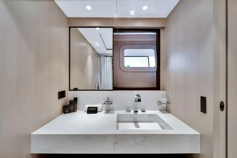 Slide: The Image of Luxurious bathroom interior of 2024 Baglietto DOM 133 yacht with modern fixtures. - 109