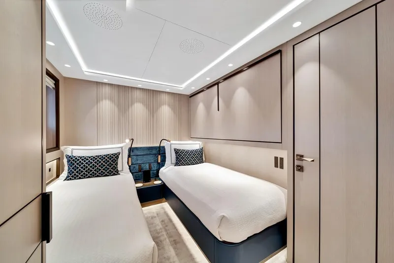 Slide: The Image of Luxurious twin bedroom on 2024 Baglietto DOM 133 yacht, featuring modern design and elegant decor. - 111
