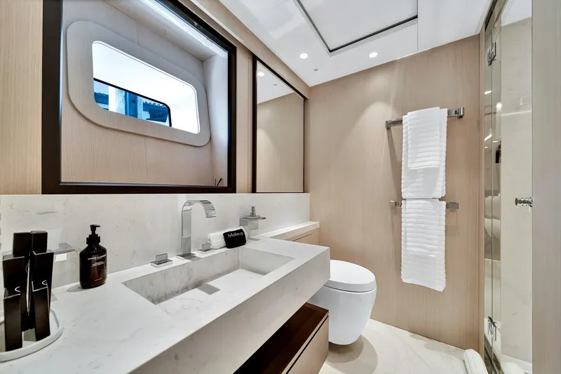 Slide: The Image of Luxurious bathroom interior of 2024 Baglietto DOM 133 yacht with modern fixtures and elegant design. - 118