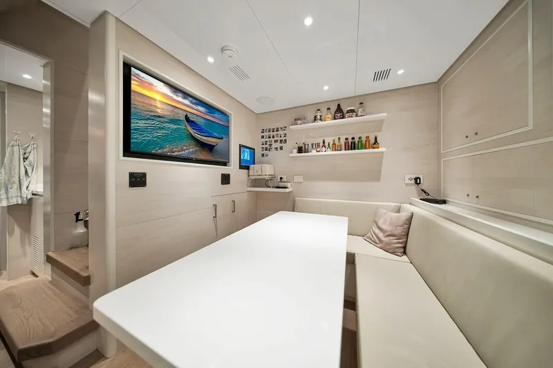Slide: The Image of Luxurious interior of 2024 Baglietto DOM 133 yacht with modern seating and wall art. - 122