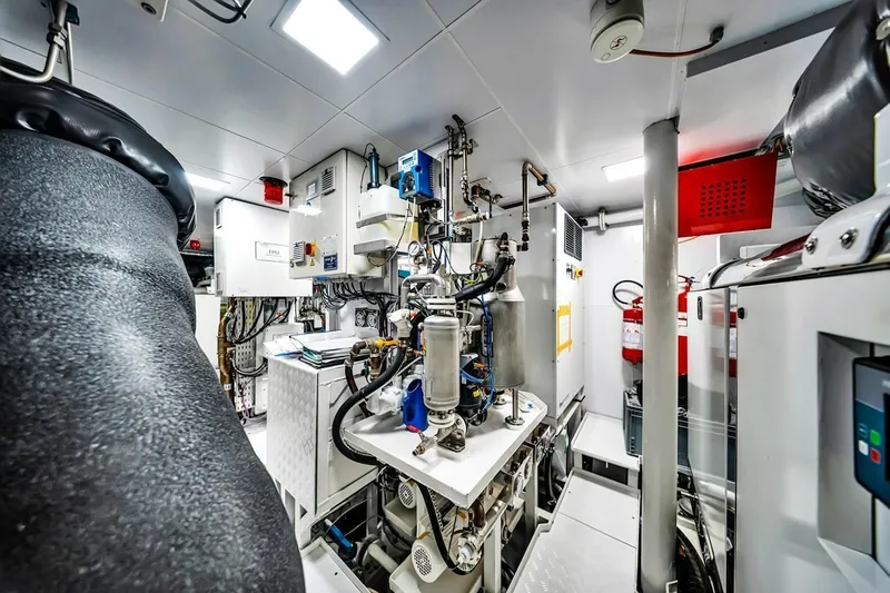 Slide: The Image of Engine room of 2024 Baglietto DOM 133 yacht, showcasing advanced machinery and equipment. - 127