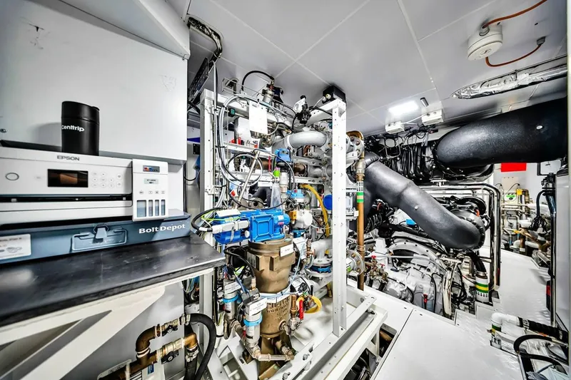 Slide: The Image of Engine room of 2024 Baglietto DOM 133 yacht, featuring complex machinery and equipment. - 132