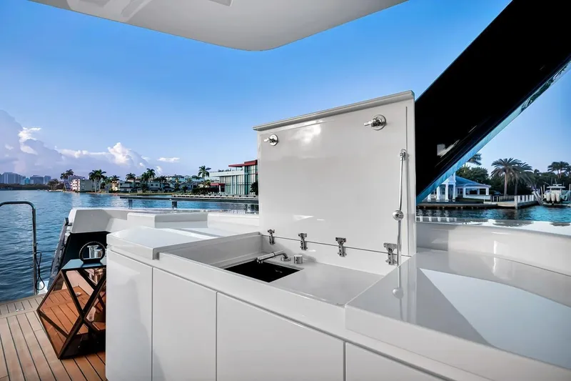 Slide: The Image of Luxurious 2024 Baglietto DOM 133 yacht deck with modern outdoor kitchen. - 17