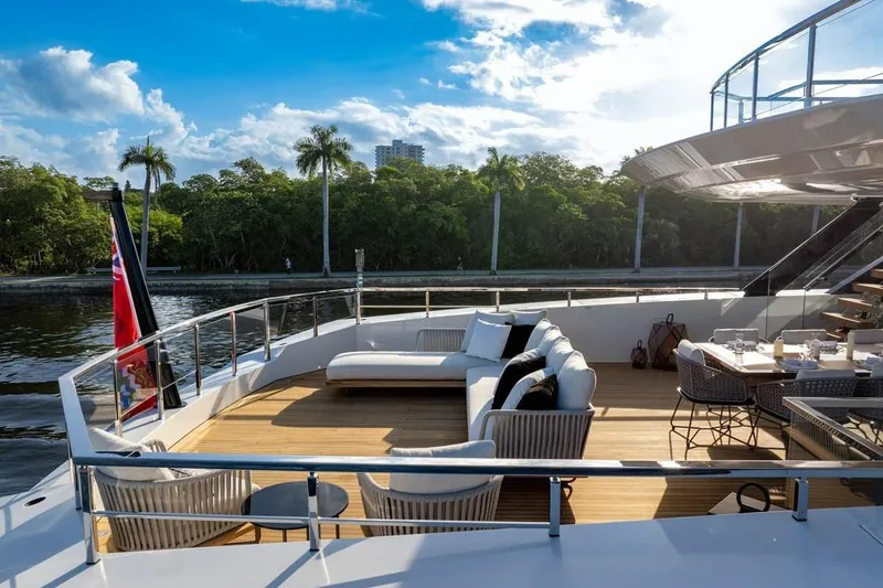 Slide: The Image of Luxurious deck of 2024 Baglietto DOM 133 yacht with elegant seating and dining area. - 27