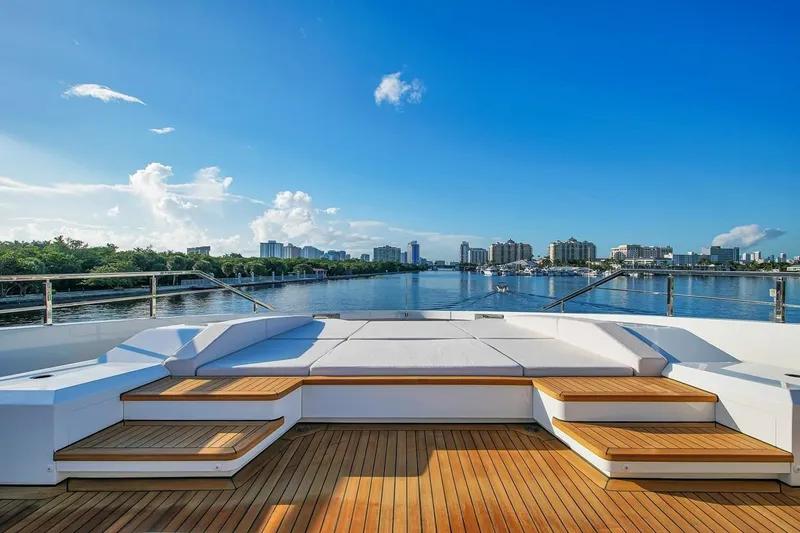 Slide: The Image of Luxurious 2024 Baglietto DOM 133 yacht deck with city skyline view. - 40