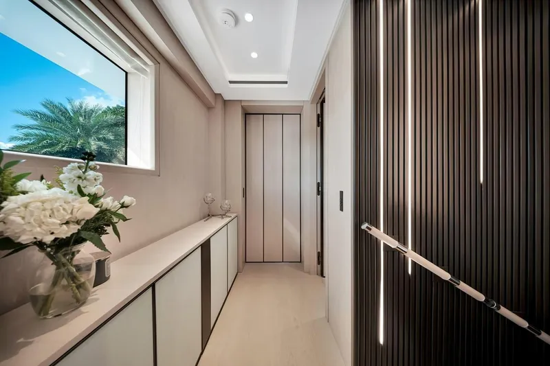 Slide: The Image of Luxurious interior hallway of 2024 Baglietto DOM 133 yacht with modern design elements. - 54