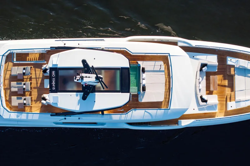 Slide: The Image of Aerial view of 2024 Baglietto DOM 133 yacht with spacious deck and luxurious seating. - 6