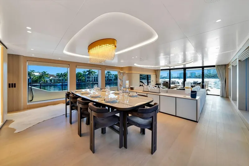 Slide: The Image of Luxurious interior of 2024 Baglietto DOM 133 yacht with elegant dining area and scenic views. - 63