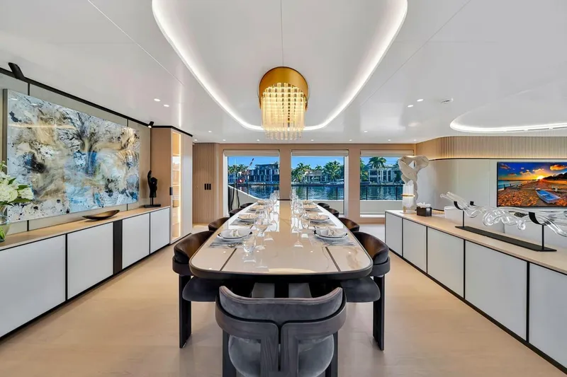 Slide: The Image of Luxurious dining area on 2024 Baglietto DOM 133 yacht with elegant decor and waterfront views. - 64