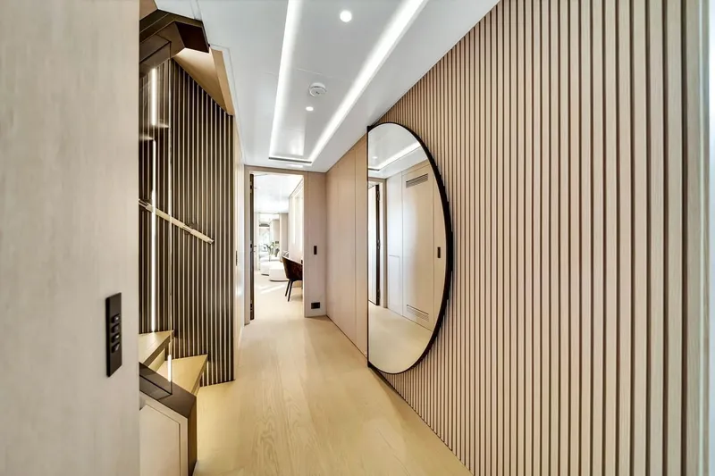 Slide: The Image of Luxurious interior hallway of 2024 Baglietto DOM 133 yacht with modern design elements. - 65