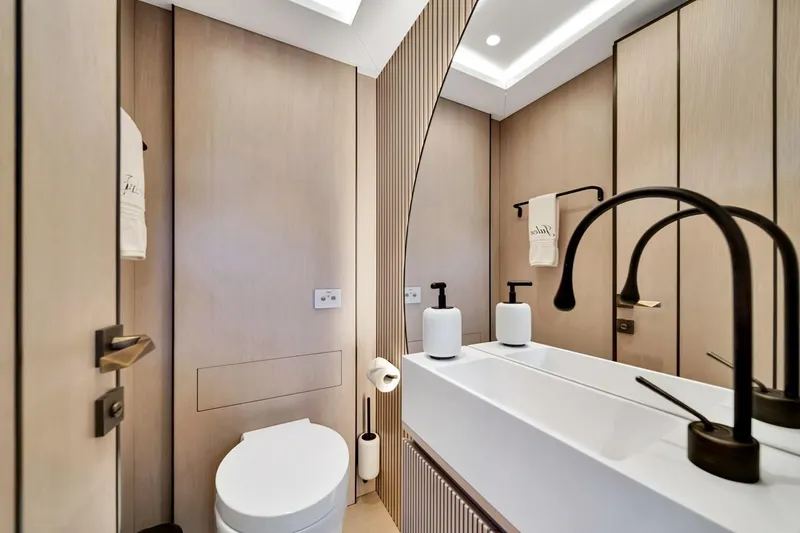Slide: The Image of Luxurious bathroom interior of 2024 Baglietto DOM 133 yacht, featuring modern fixtures and elegant design. - 67