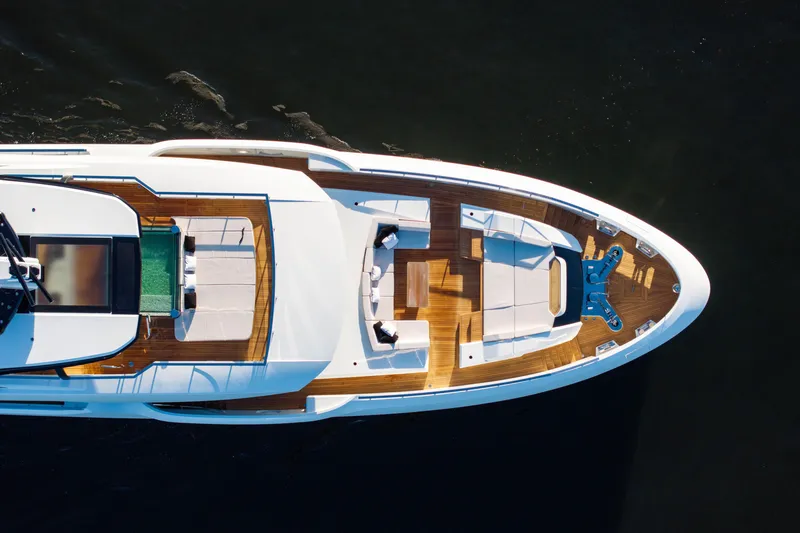 Slide: The Image of Aerial view of 2024 Baglietto DOM 133 yacht with sleek design and luxurious deck. - 7