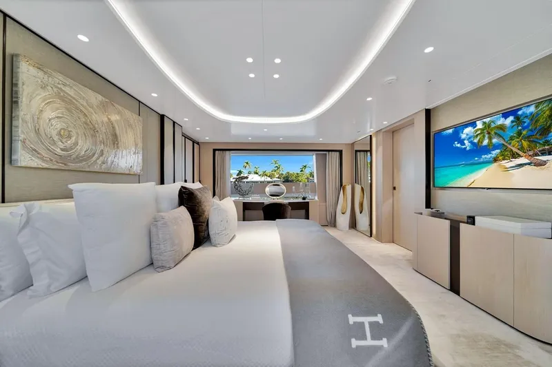 Slide: The Image of Luxurious bedroom interior of 2024 Baglietto DOM 133 yacht with modern decor and ocean view. - 72