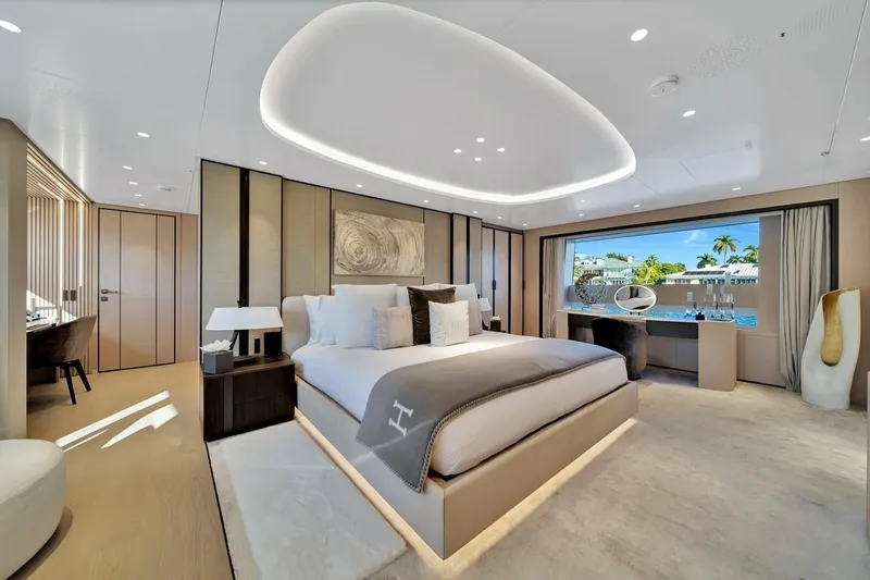 Slide: The Image of Luxurious bedroom interior of 2024 Baglietto DOM 133 yacht with modern design and large window view. - 77