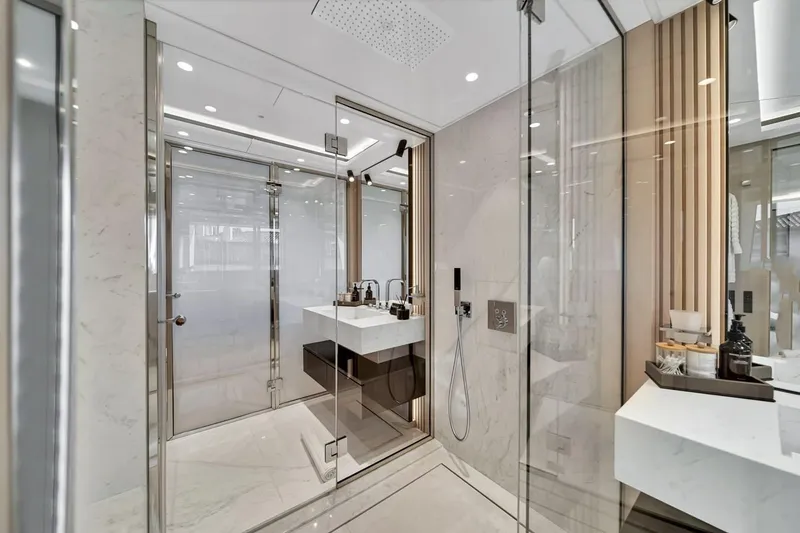 Slide: The Image of Luxurious bathroom interior on 2024 Baglietto DOM 133 yacht, featuring modern design and elegant fixtures. - 80