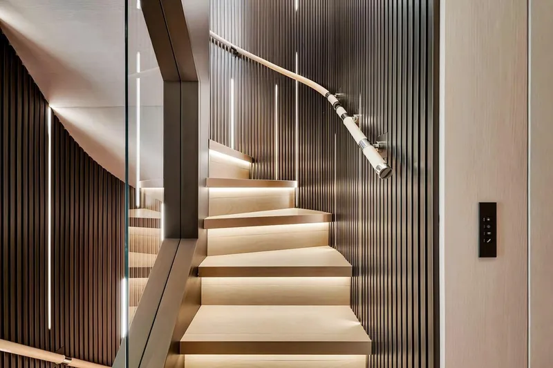 Slide: The Image of Modern staircase with sleek lighting on Baglietto DOM 133 yacht, 2024 model. - 84