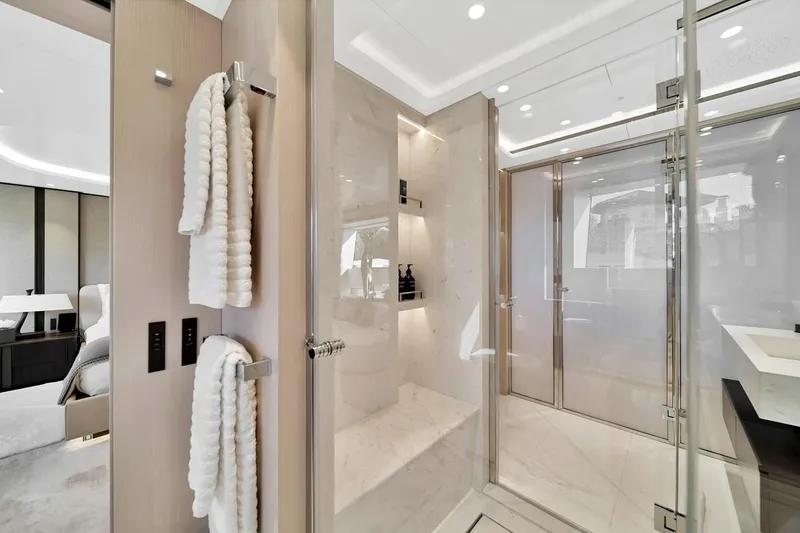 Slide: The Image of Luxurious bathroom interior on 2024 Baglietto DOM 133 yacht, featuring elegant marble and modern fixtures. - 85