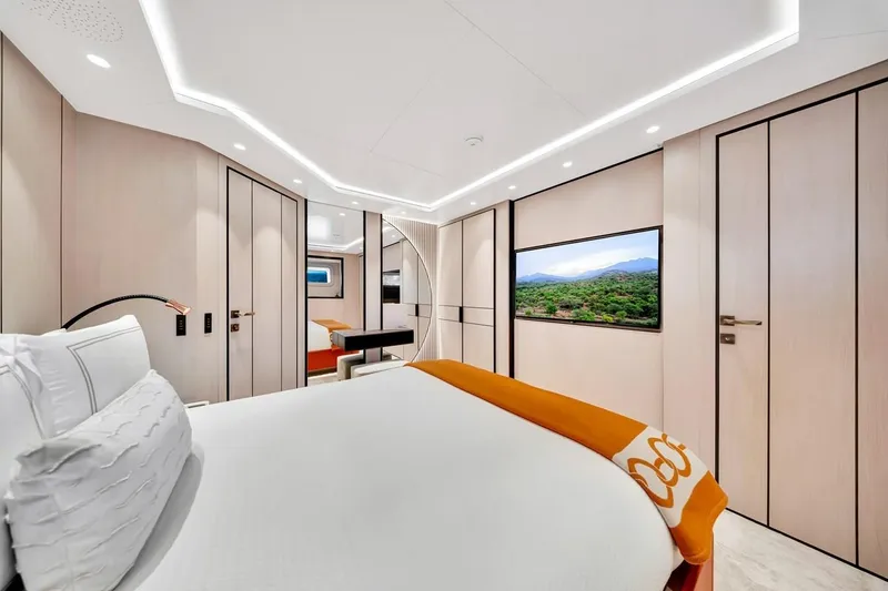 Slide: The Image of Luxurious 2024 Baglietto DOM 133 yacht bedroom with modern design and elegant lighting. - 86