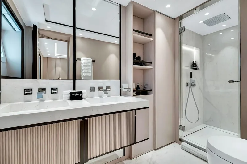 Slide: The Image of Luxurious bathroom on 2024 Baglietto DOM 133 yacht with modern fixtures and spacious shower. - 97